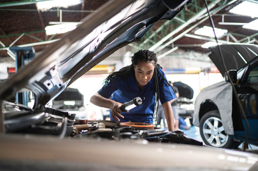 Women inspecting car